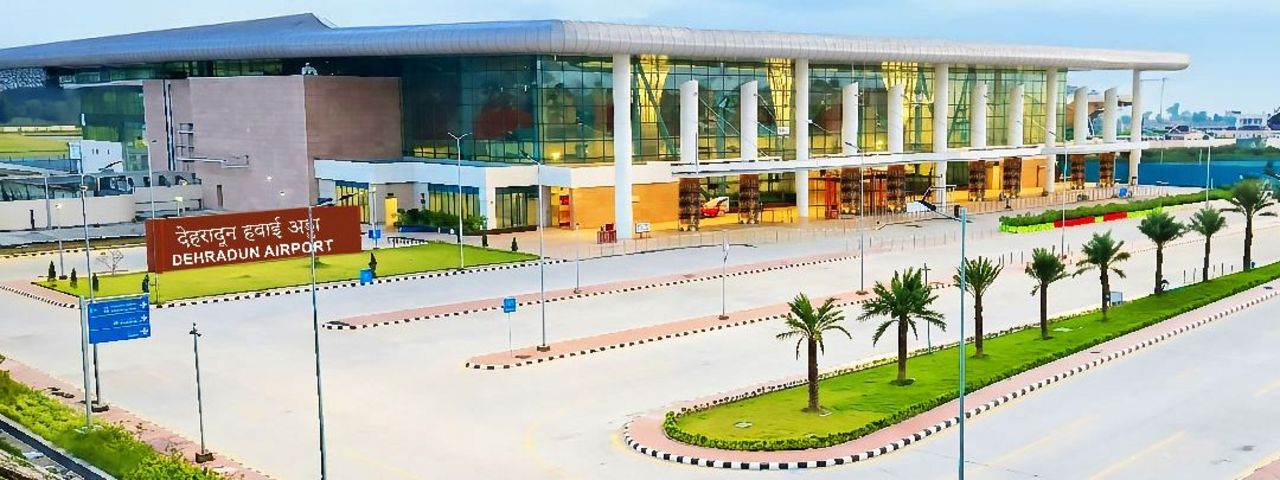 Dehradun Airport terminal development showcasing terminal architecture, landside transportation planning, and passenger circulation areas.